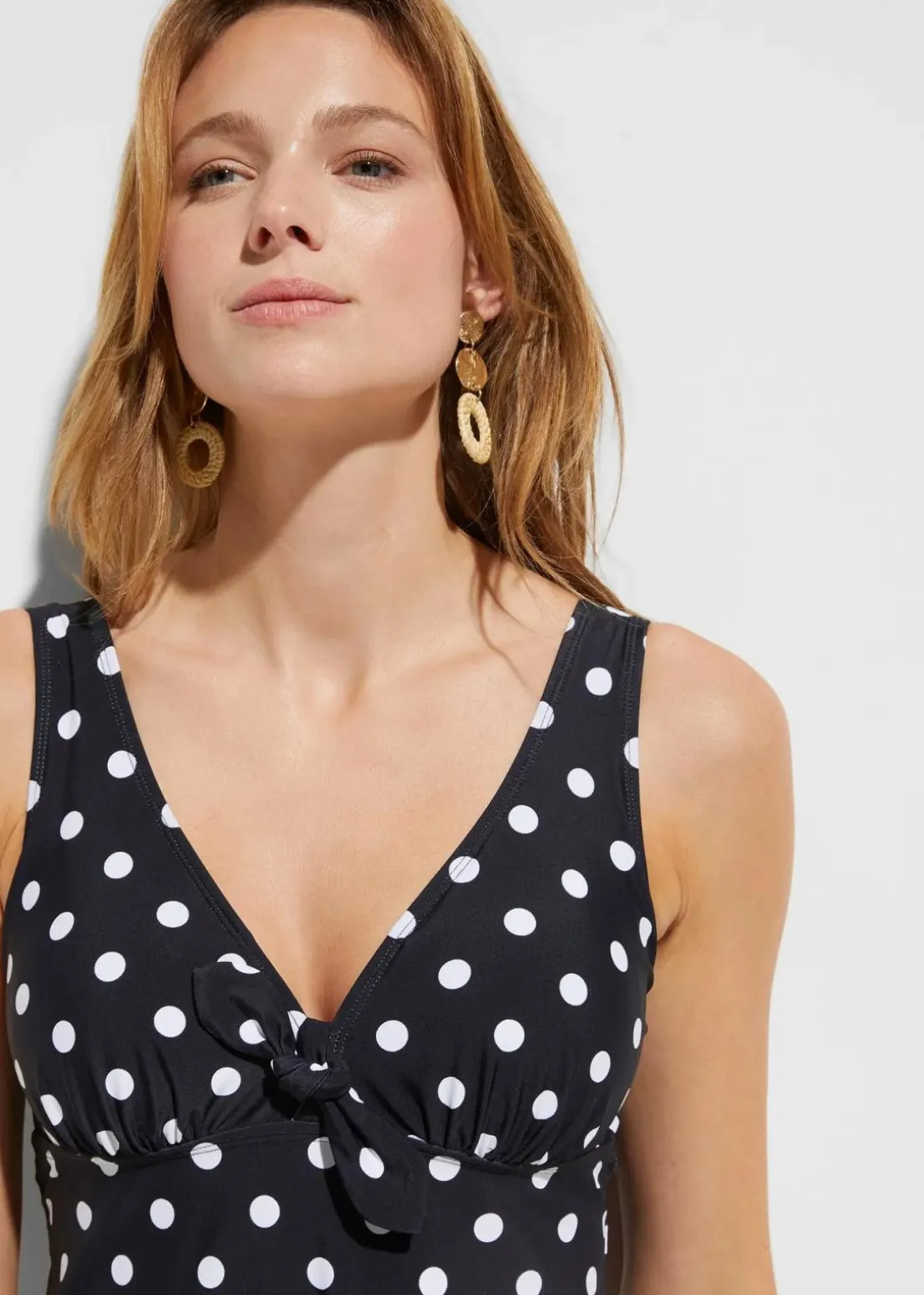 Badekleid mit breiten Trägern