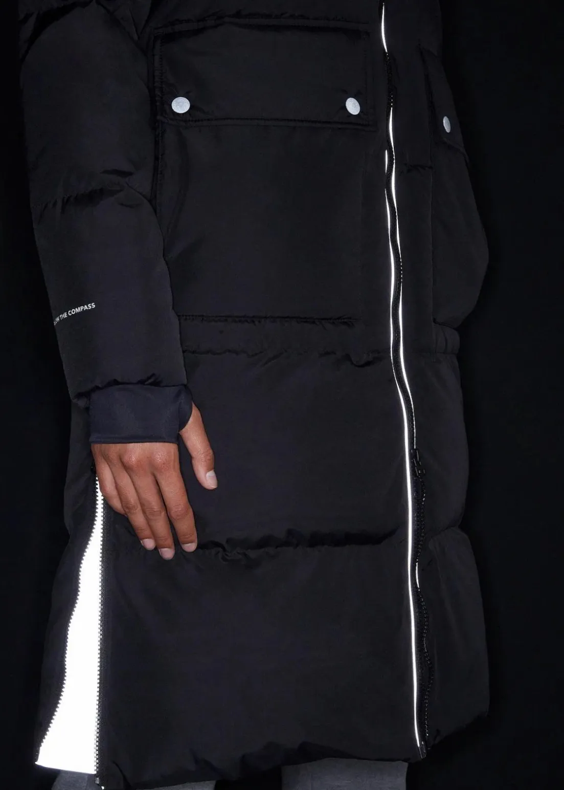 Daunenmantel mit reflektierenden Details