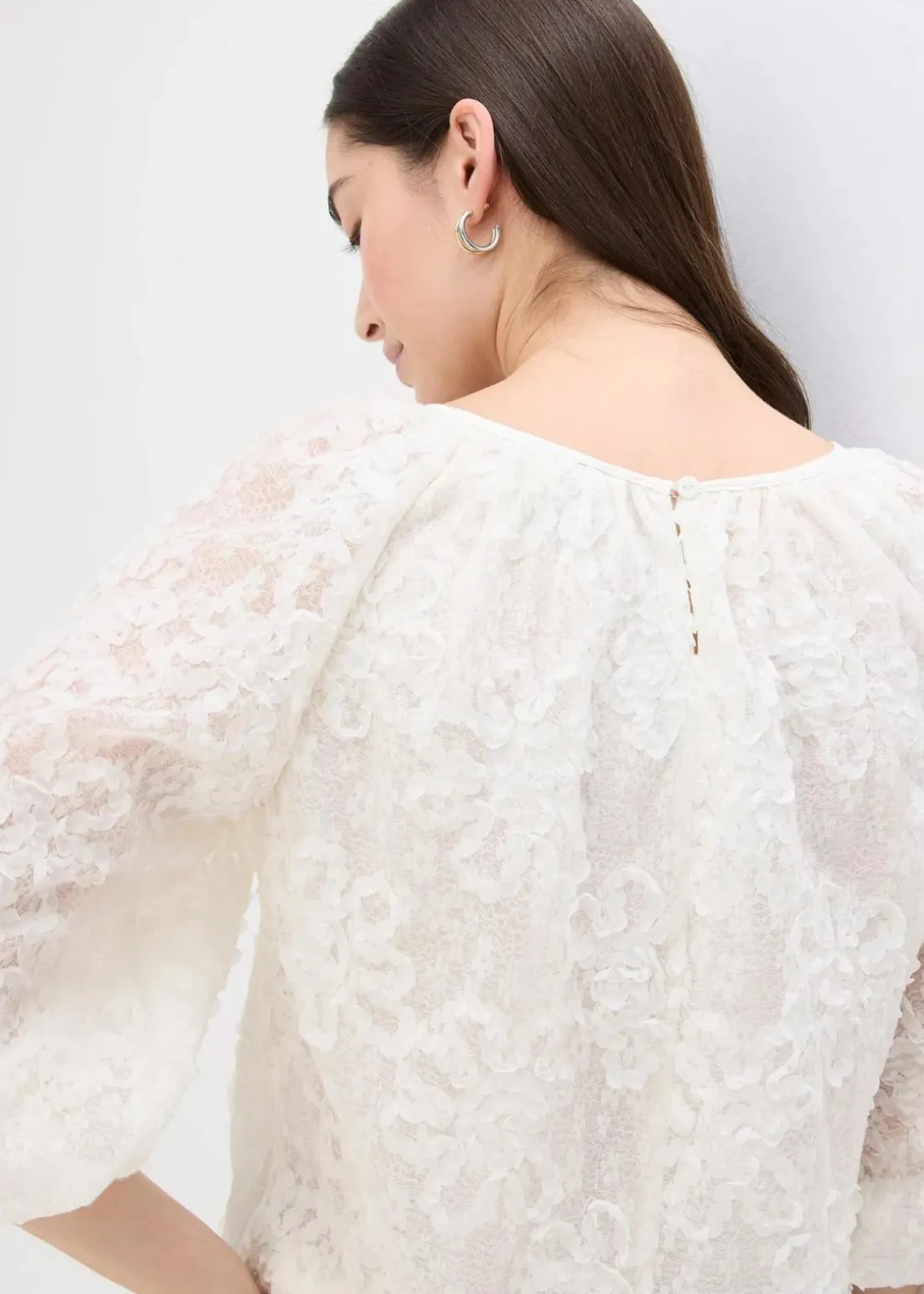 Schlupfbluse mit strukturiertem Blumen-Muster