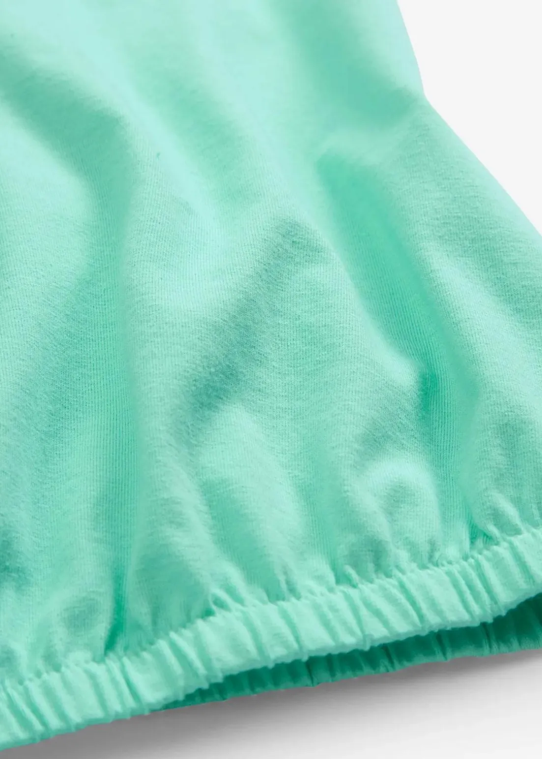 Shirt mit elastischem Bündchen