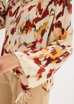 Tunikabluse mit metallischen Garn